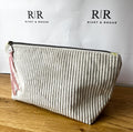 Grey jumbo cord make-up bag with contrasting Tilda lining.