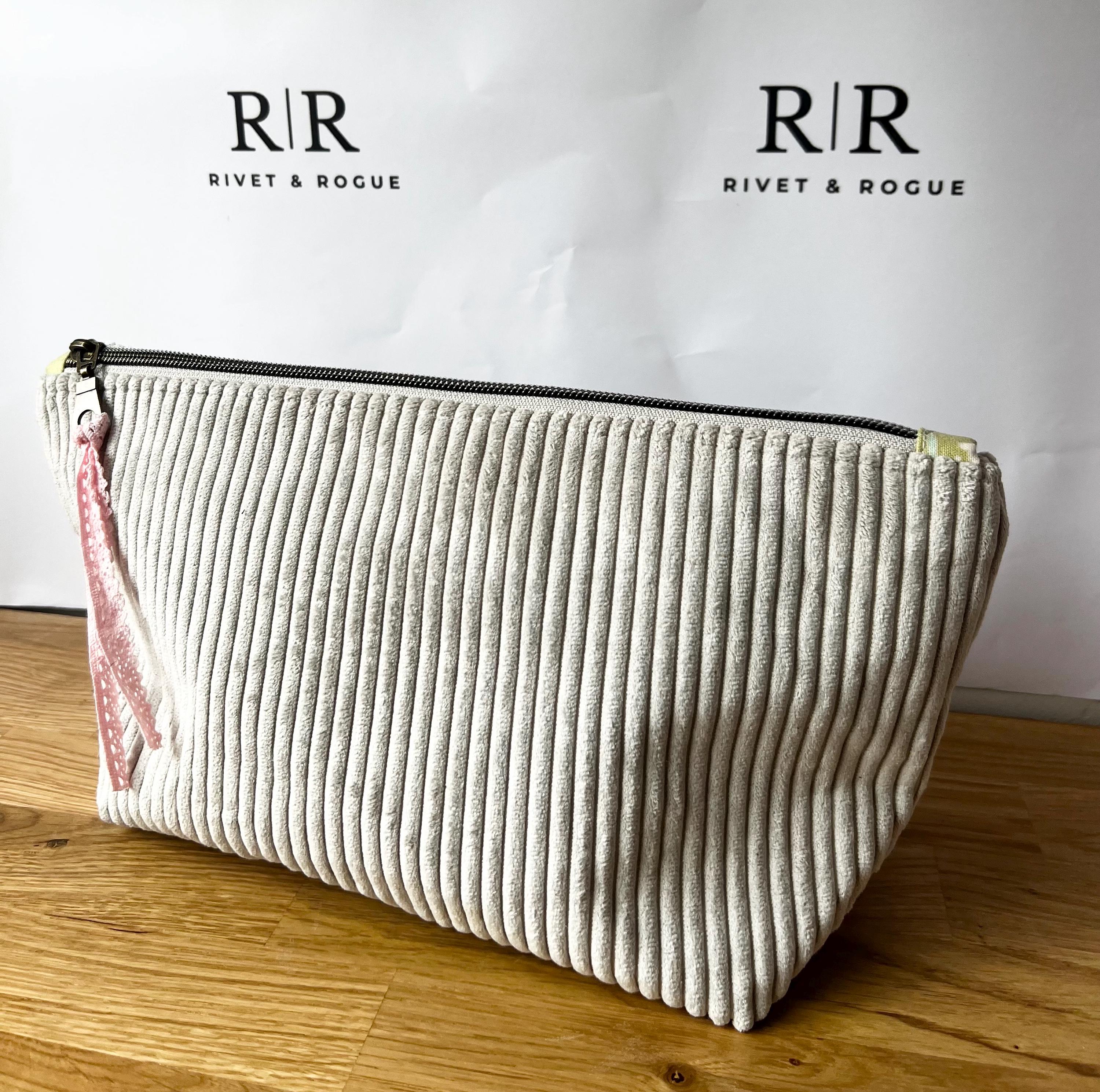 Grey jumbo cord make-up bag with contrasting Tilda lining.