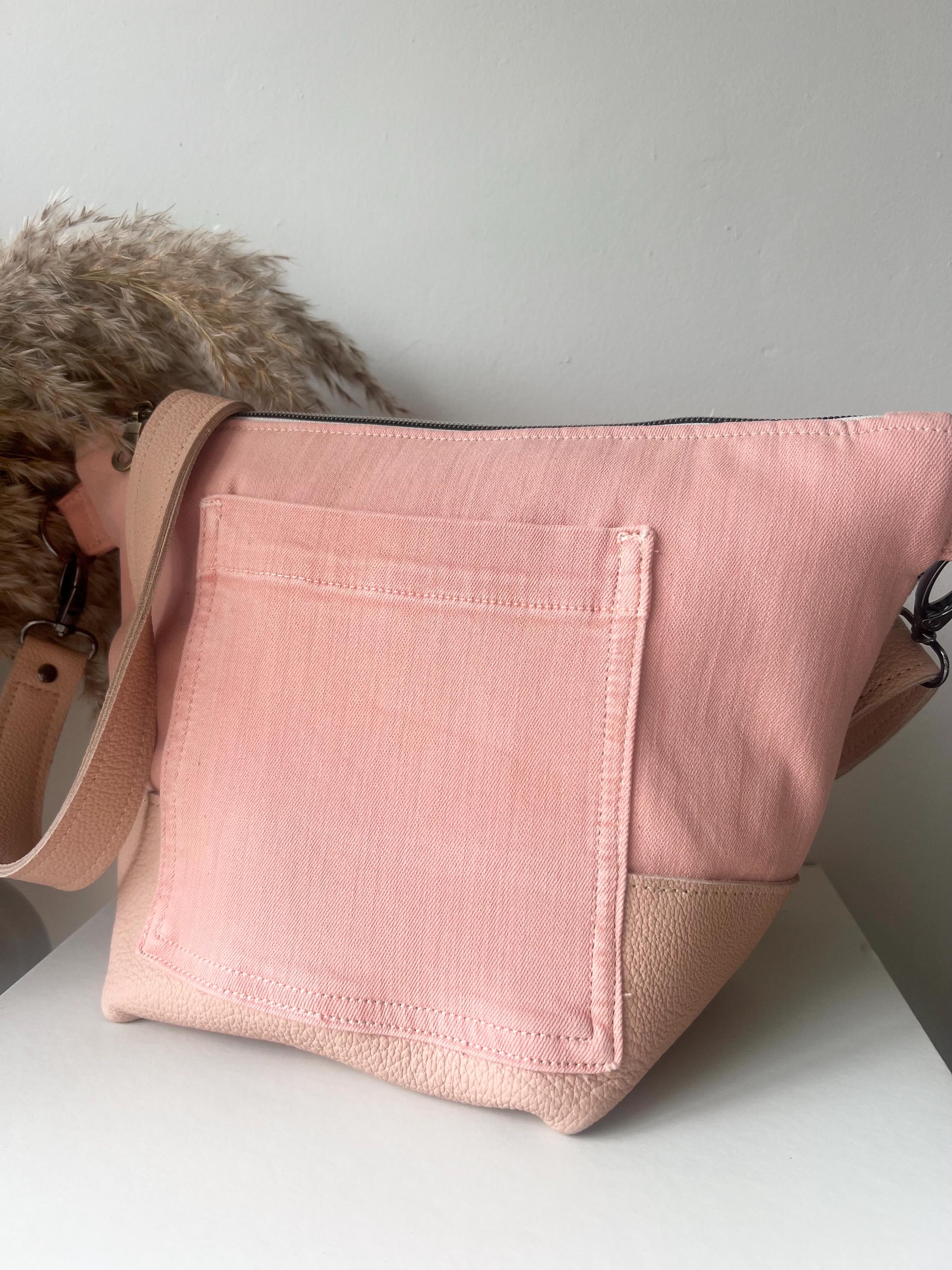 Handcrafted leather and denim cross body bag