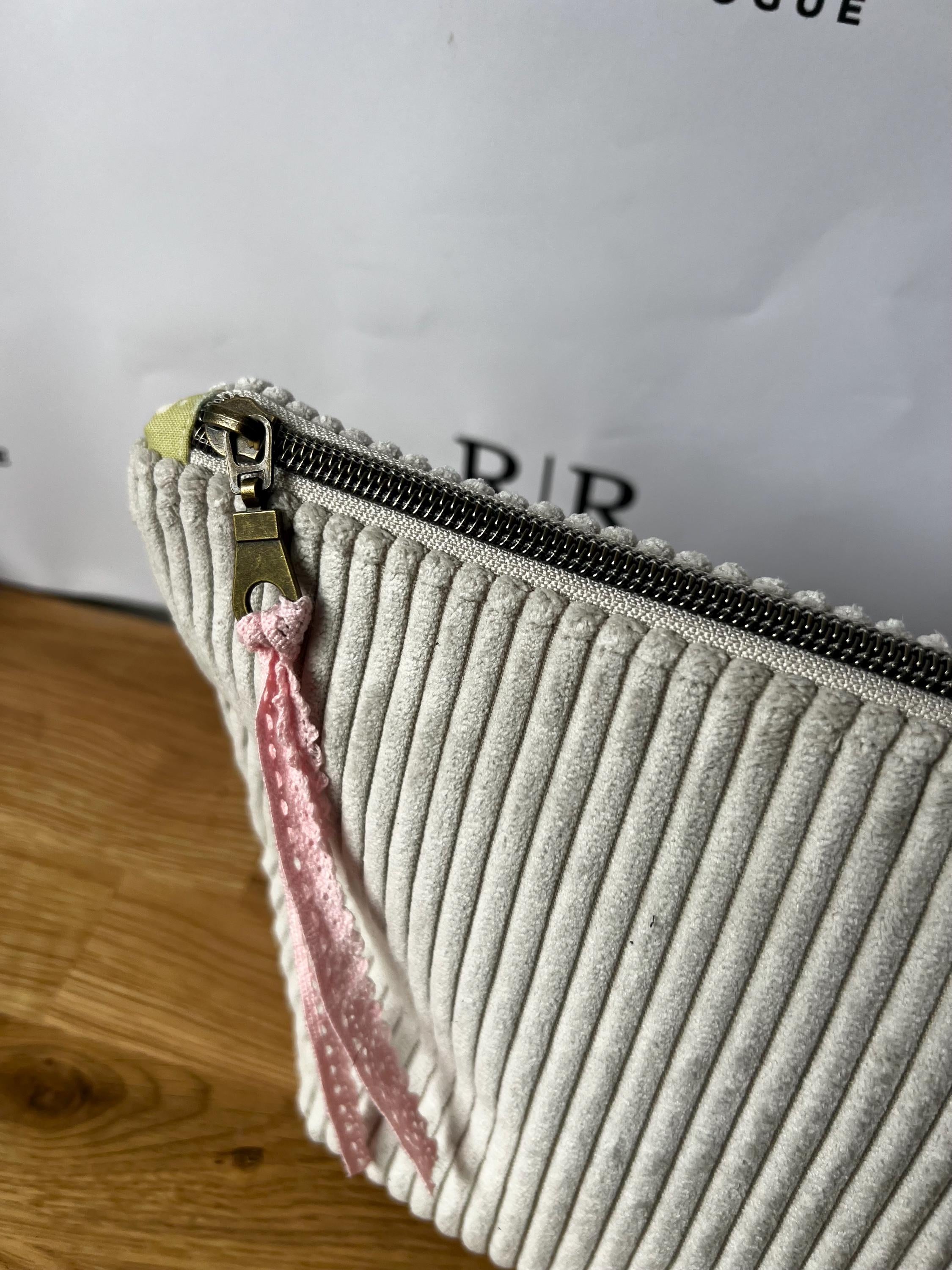 Grey jumbo cord make-up bag with contrasting Tilda lining.