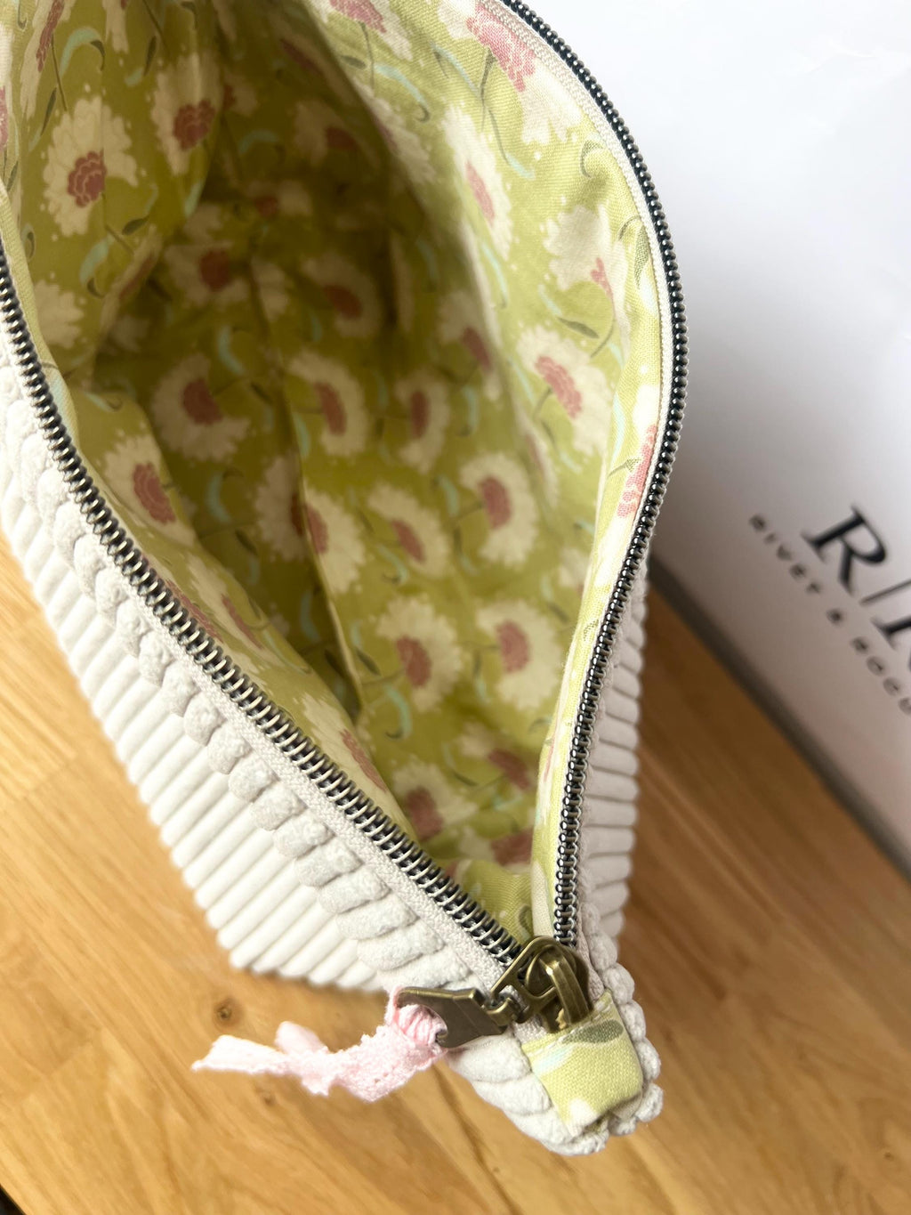 Grey jumbo cord make-up bag with contrasting Tilda lining.